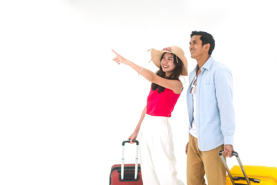 Young Adult Asian Travel Couple With Luggage On Isolated White Background