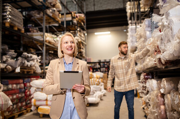 Close up of a group of workers working in a warehouse