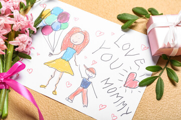 Picture with text LOVE YOU MOMMY, gift box and flowers on beige background. Mother's Day celebration