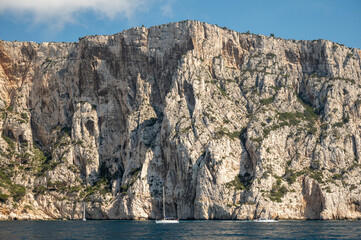 Fototapeta na wymiar Limestone cliffs near Cassis, boat excursion to Calanques national park in Provence, France