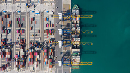 Container cargo ship at industrial port in import export commercial trade global business logistic and transportation of international container cargo ship boat, Aerial view container commercial port.