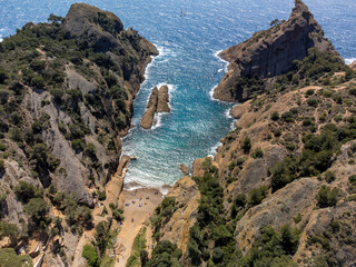 Fototapeta na wymiar Rocher du capucin cliff in blue Calanque de Figuerolles near La Ciotat, Provence, France