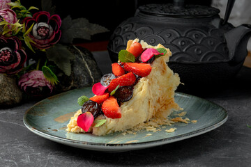 Delicious creamy napoleon cake with fresh berries on plate