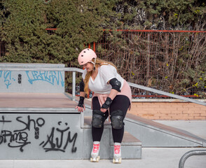 Confident woman enjoying her skatepark ride