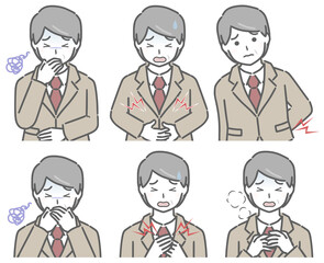 体調が悪いスーツの中年男性