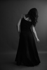 dramatic portrait of dancer, body details and beautiful pose of movement, defocus and frame on film...