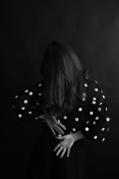 Portrait of woman with hair covering her face, texture of female hair