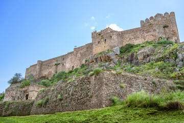 Fototapeta na wymiar Low angle view of medieval fortress known as Castillo de la Luna or Moon Castle in Alburquerque, Spain