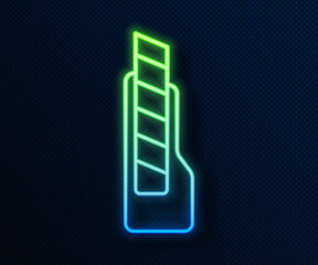 Glowing neon line Stationery knife icon isolated on blue background. Office paper cutter. Vector
