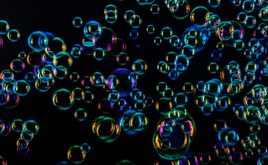 soap colorful bubbles floating in the air.