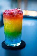 barbados cocktail, with rainbow colors and various flavors. Rum, orange, lime, sugar