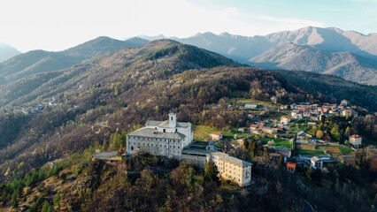 Fototapeta na wymiar Aerial view of Sanctuary of Saint Ignatius of Loyola situated in the Lanzo Valleys in Italy. Tourist attraction and famous place of pilgrimage in Province of Turin, Piedmont region. Drone photography.