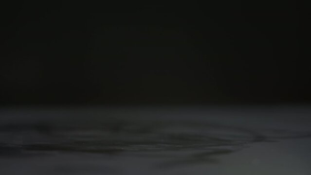 White digital pen designed for touch screen of tablet on dark background. Stylus used for work on modern device extreme close view