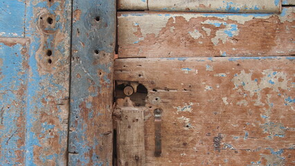 Fragment of an old door made of natural wood, Cuba, Havana