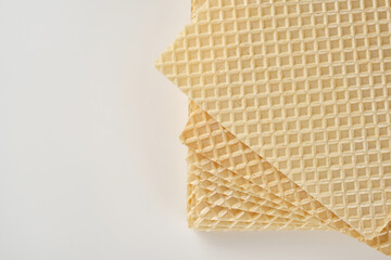 Stack of wafer or waffle sheets. Pattern wafle texture. Shallow depth of field. Top view