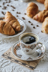 cup of coffee and croissant