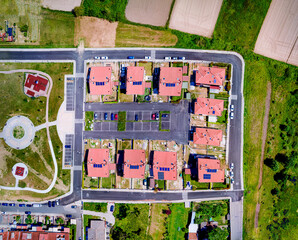 Houses in suburb at summer, overhead aerial view from drone. Luxury houses with nice landscape.