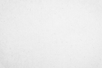 White recycled craft paper texture as background. Grey paper texture, Old vintage page or grunge vignette of old cardboard. 