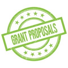 GRANT PROPOSALS text written on green vintage stamp.