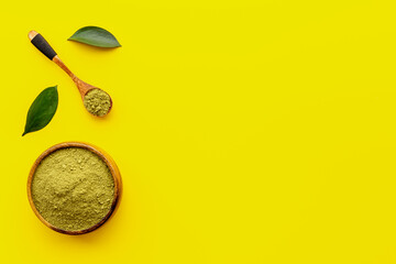 Matcha tea powder with green leaf. Asian beverage concept