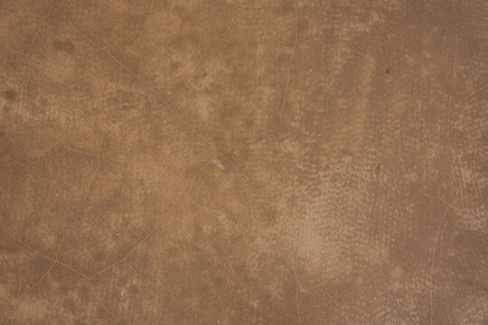 Brown concrete texture. Stone wall background. Surface of the concrete old floor in scratches, which you can use as overlay in your design. High quality photo