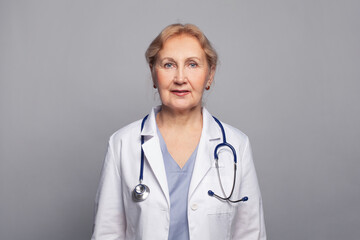 Portrait of mature doctor with stethoscope. Medical service