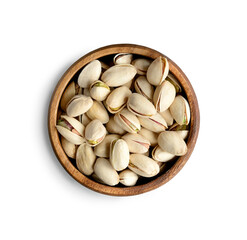 Pistachios in a wooden cup, close-up isolated on a white background.