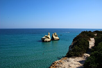 Obraz premium Italy, Puglia, Lecce: Rocks called the two sisters in Salento.