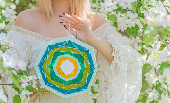  Woman with mandala and magic ball. Energy reiki concept, clean from negative energy
