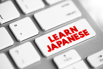 Learn Japanese text button on keyboard, concept background