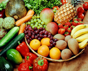 Fresh tropical fruits and vegetables background