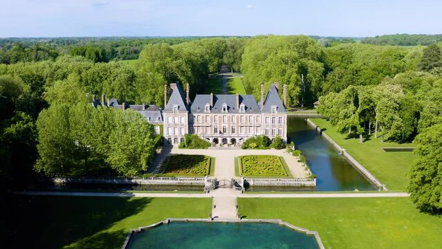 Aerial View Shot of Castle. Ch&acirc;teau de Courances (Domaine de Courances). French castle. drone aerial view with landscaped gardens and the surrounding area. 