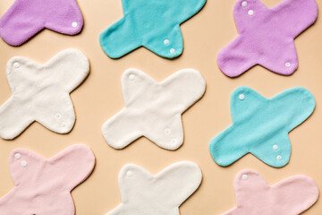 Eco-friendly reusable fabric women's pads. set of colorful bright reusable menstrual pads. zero waste woman periods concept top view with copy space