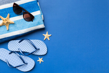 Summer vacation concept flat lay. beach accessories and towel top view. Space for text. travel concept