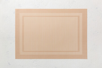 Top view of brown tablecloth for food on cement background. Empty space for your design