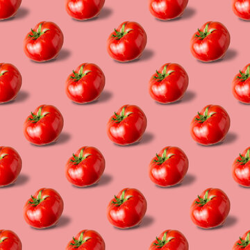 ripe red tomato on pink background, seamless pattern, creative photo