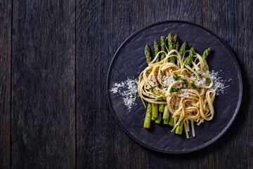 roasted asparagus with pasta, cheese on plate