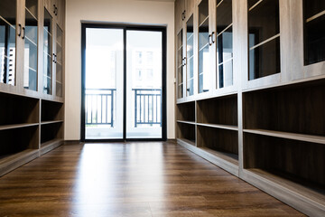 Empty closets in modern cloakroom