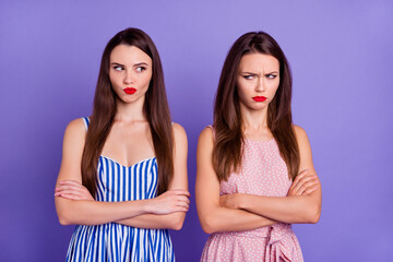 Photo of unhappy sad two best friends dressed summer clothes arms folded having problems isolated purple color background