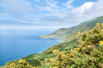 coastal sea and mountain scenery with vivid colors