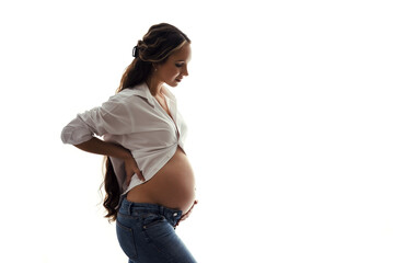 Pregnancy, motherhood, people and expectation concept - close up of happy pregnant woman with big belly on white background isolated