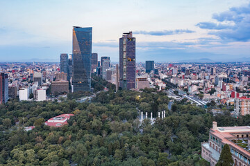 Obraz premium Aerial drone view of Chapultepec Park, city in the background, Mexico City, Mexico