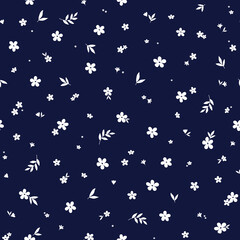 Floral seamless pattern with cute small white flowers on blue background. Ditsy print for fabric, textile, baby clothes, bed linen.