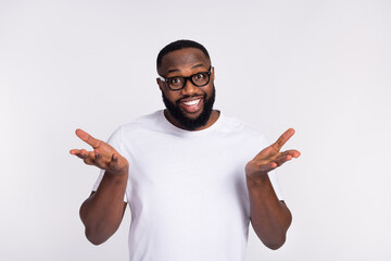 Photo of cute charming guy dressed casual t-shirt eyeglasses telling speaking you isolated white...