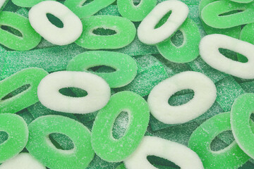 Assorted green gummy candies background. Top view. Jelly  sweets.