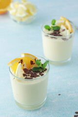 Orange lemon citrus milk mousse in glasses