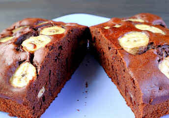 Closeup of Mouthwatering Moist Texture of Wholemeal Chocolate Banana Cake on a Plate