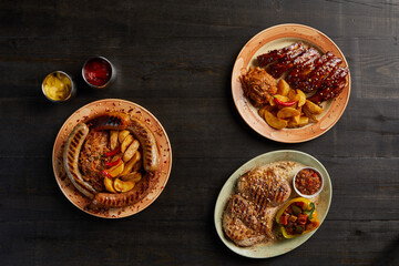 Overhead view of assortment of grilled food