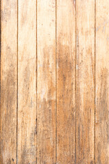 Texture of wood strips arranged vertically with weathered varnish.