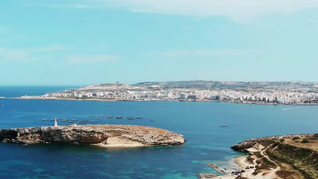 City of Bugibba with St Pauls Island in the foreground